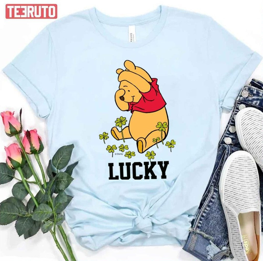 Pooh Playing In A Shamrock Patch Winnie The Pooh Unisex T-Shirt