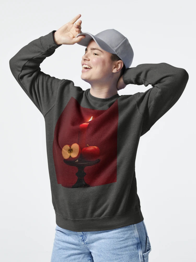 Burning candle with red apple on rustic board Classic T-Shirt