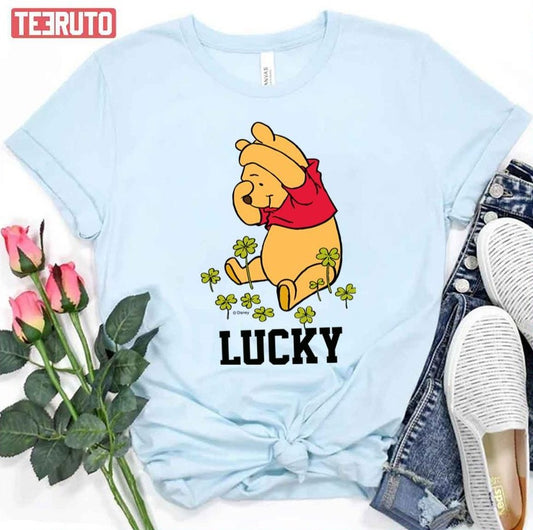 Pooh Playing In A Shamrock Patch Winnie The Pooh Unisex T-Shirt