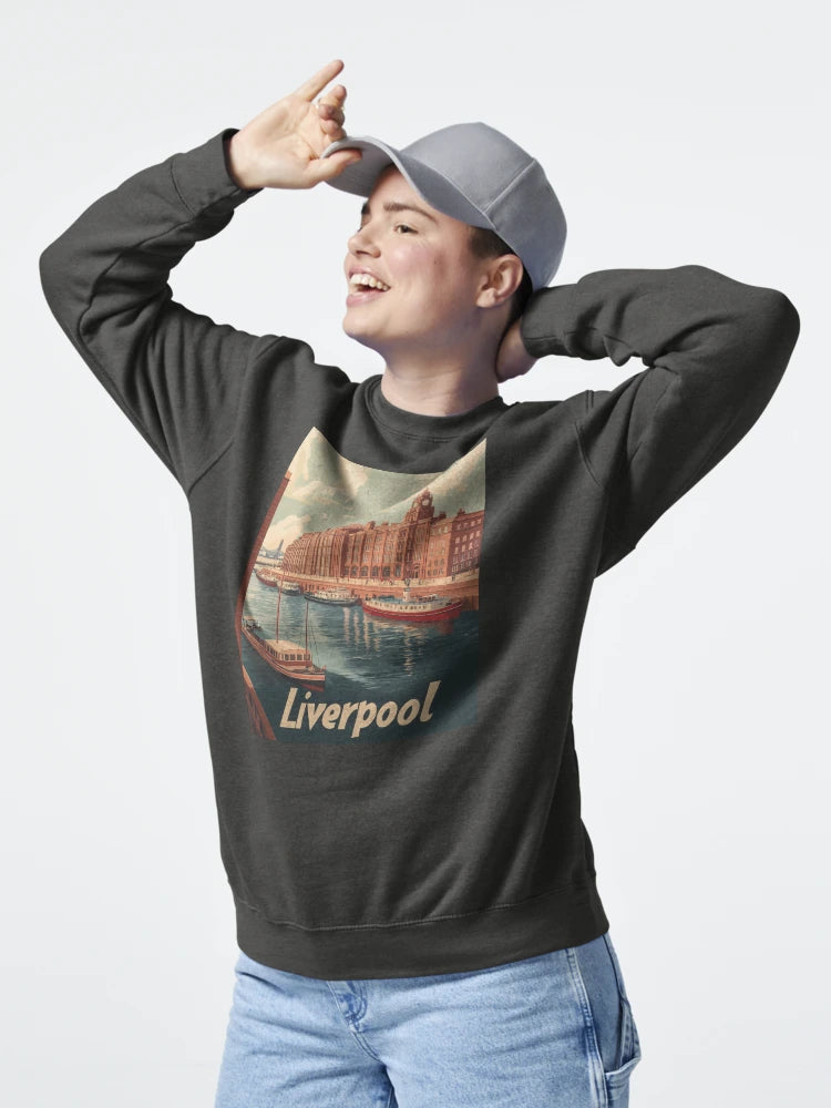 This classic travel poster features Liverpools beautiful waterfront, boasting elegant buildings and boats on the river, inviting visitors to Classic T-Shirt